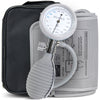 A gray sphygmomanometer with an all-in-one dial, bulb, and valve design in front of a blood pressure cuff and travel case. 
