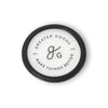 A black diaphragm cover for a stethoscope with the brand logo and text 'GREATER GOODS' on a white background.