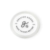 A white diaphragm cover for a stethoscope with the brand logo and text 'GREATER GOODS' on a white background.